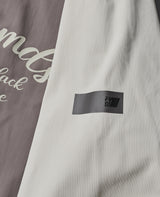 バイカラーストレッチジップアップ