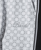 オールオーバー スウィッチライン スリムテーパードパンツ