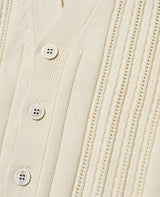 ケーブル編みカーディガン